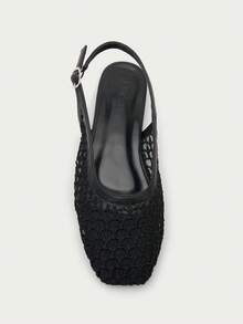 Nöista Slingback Flat In Black, Crafted With Woven Textile And Mesh Detailing.
Features A Smooth Faux Leather Trim And Adjustable Back Strap With Buckle For A Secure Fit.
The Lightweight Design Adds A Modern, Elegant Touch, Perfect For Both Casual And Refined Looks. - Black 4 - View 5