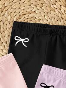 SHEIN Playful Pals Bộ 4 món quần legging/quần short/quần dài màu trơn cho bé gái, cạp chun, thiết kế nơ dễ thương, màu hồng Dopamine & kem, trang phục mùa xuân hè, trang phục thường ngày, quần áo trẻ em họa tiết hoa, bộ đồ mùa xuân hè, kiểu dáng mới, thư giãn, không khí mùa xuân, kỳ nghỉ hè thư thái - Nhiều màu - Xem 4