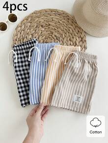 SHEIN Explorewe Bộ 4 món quần short thể thao thường ngày cho bé trai, phong cách đường phố, kẻ caro và sọc, phù hợp cho mặc hàng ngày, đi học, dã ngoại, thể thao, mùa xuân và mùa hè. Thiết kế đơn giản và thời trang, thoải mái khi mặc, mang đến nhiều lựa chọn phối đồ cho bé trai. Bộ trang phục này sẽ là lựa chọn sành điệu cho bé trai trong mùa hè, phù hợp cho kỳ nghỉ, chụp ảnh, xu hướng thời trang mới xuân/hè 2026. - Nhiều màu - Xem 3