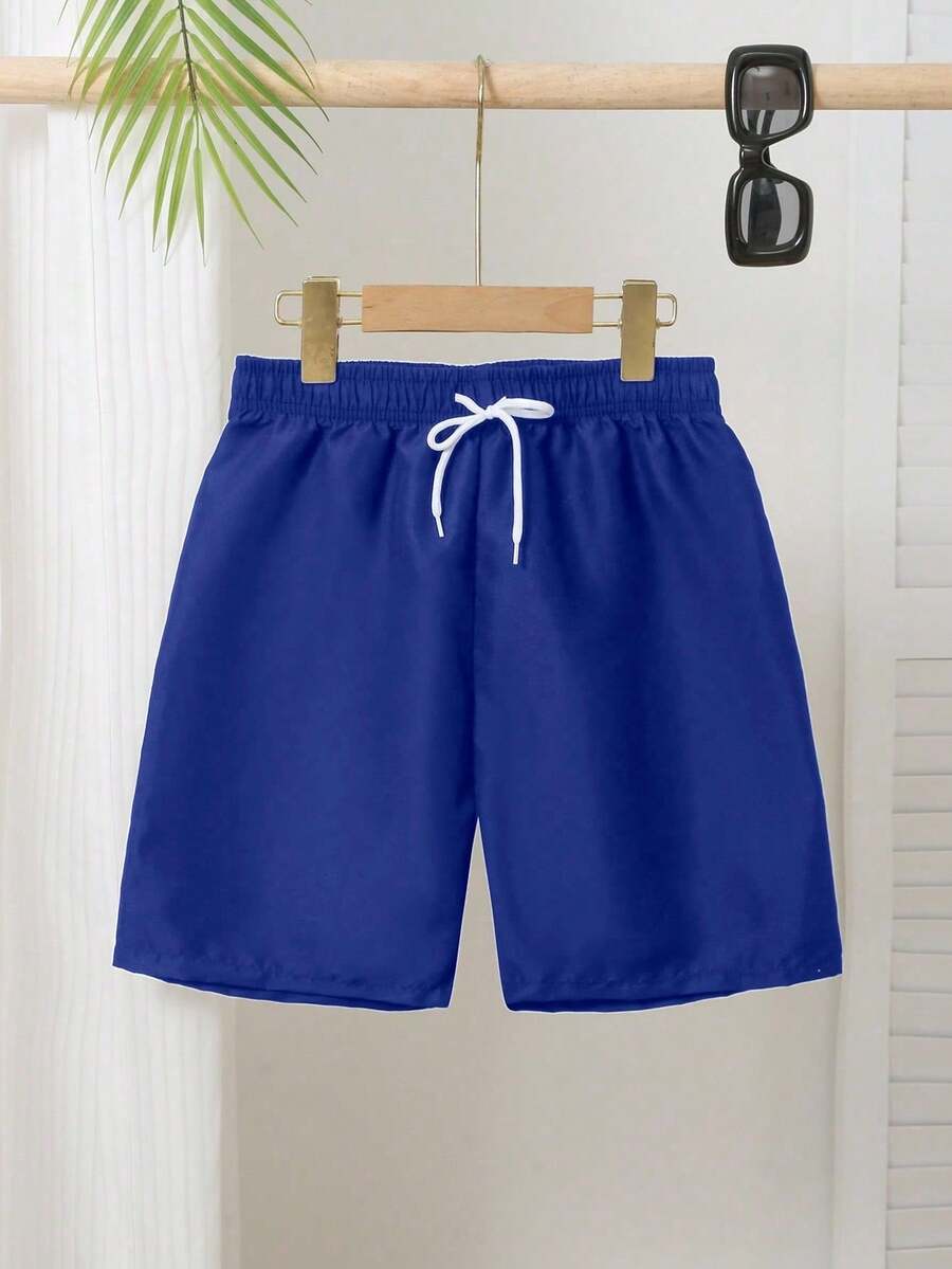 SHEIN Tween Boys Swimwear, Classic Solid Navy Blue Beach Shorts, Adjustable Drawstring Waist, Suitable For Summer Beach Vacation - Royal Blue - View 1