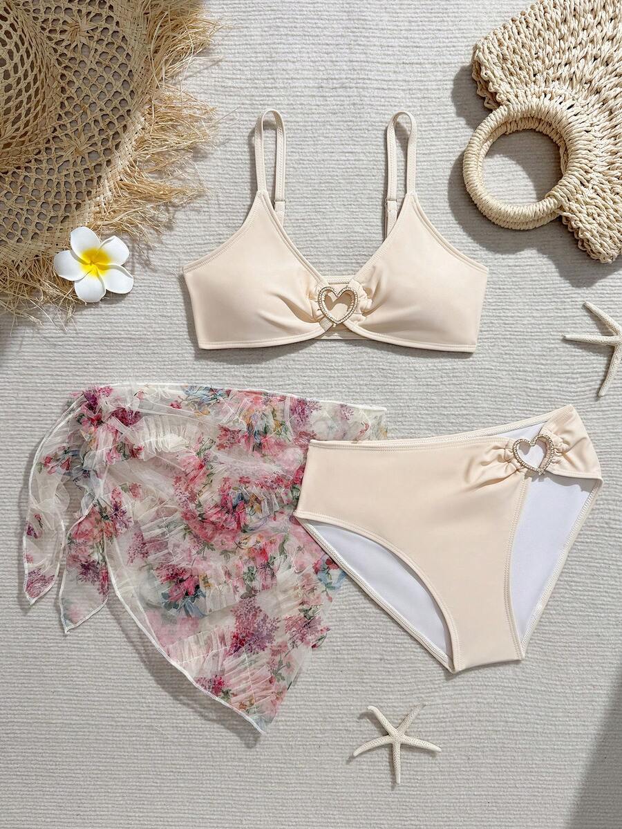 SHEIN Bộ đồ bơi 3 mảnh dễ thương cho bé gái tuổi teen với khăn choàng/viền bèo nhún/thiết kế thời trang, thanh lịch, phù hợp cho bơi lội, kỳ nghỉ hè, bãi biển, hồ bơi, tiệc tùng. Bikini cạp cao kín đáo cho bé gái tuổi teen, bikini hoa hai mảnh cho tuổi teen, đồ bơi 2 mảnh cho tuổi teen, đồ bơi màu be cho tuổi teen, đồ bơi in hoa cho bé gái, bikini dây mảnh có thể điều chỉnh, đồ đi biển cho bộ bikini cho bé gái từ 7 đến 10 tuổi, đồ bơi, bộ bikini cho tuổi teen. - Màu be - Xem 1