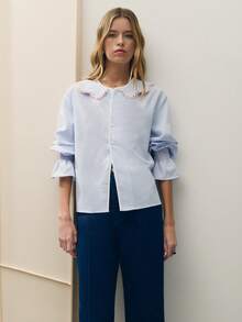 Nöista Striped Blouse With Floral Trim And Puff Sleeves For Summer Vacation And Casual Chic Looks. - Blue - View 1