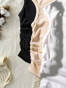 SHEIN Đây là bộ ba áo thun dành cho bé gái và thiếu niên. Áo có thiết kế cổ tròn, liền thân, vai rộng, không tay và kiểu dáng ôm sát với phần hông hơi nhăn. Những chiếc áo ngắn tay này rất tiện lợi cho các bé gái mặc hàng ngày vào mùa hè và dễ dàng phối hợp với các loại quần áo khác. - màu đen - Xem 6