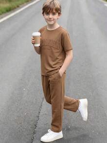 SHEIN 2pcs/Set Tween Boys' Brown Summer Casual City Break College Style Big Letter Embossed Graphic Round Neck Short Sleeve T-Shirt And Pants Sports Set - Coffee Brown - View 4