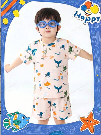 SHEIN Set de 2 piezas con camiseta de cuello redondo de manga corta y pantalones cortos con estampado de animales marinos de dibujos animados para niño pequeño, adecuado para uso casual de verano y vacaciones