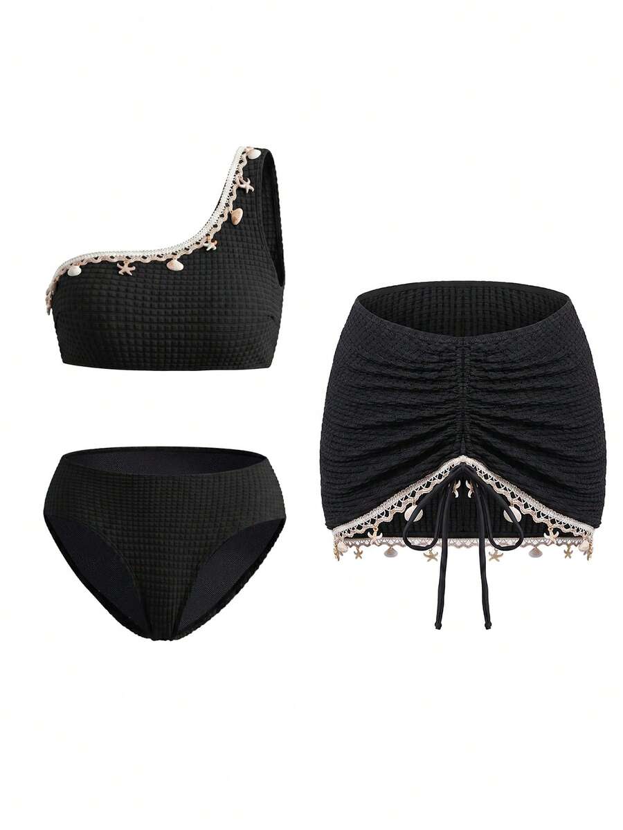 Swim Oasis Women's Summer New Beach Swim Fashion Vacation Exquisite High-End Elegant Textured Fabric Ocean Shell Woven Strap Pendant Decor Bandeau Asymmetrical Neck Bikini With Drawstring Adjustable Skirt 3-Piece Swimwear Set Suitable For Beach Vacation Swimming - Black - View 1