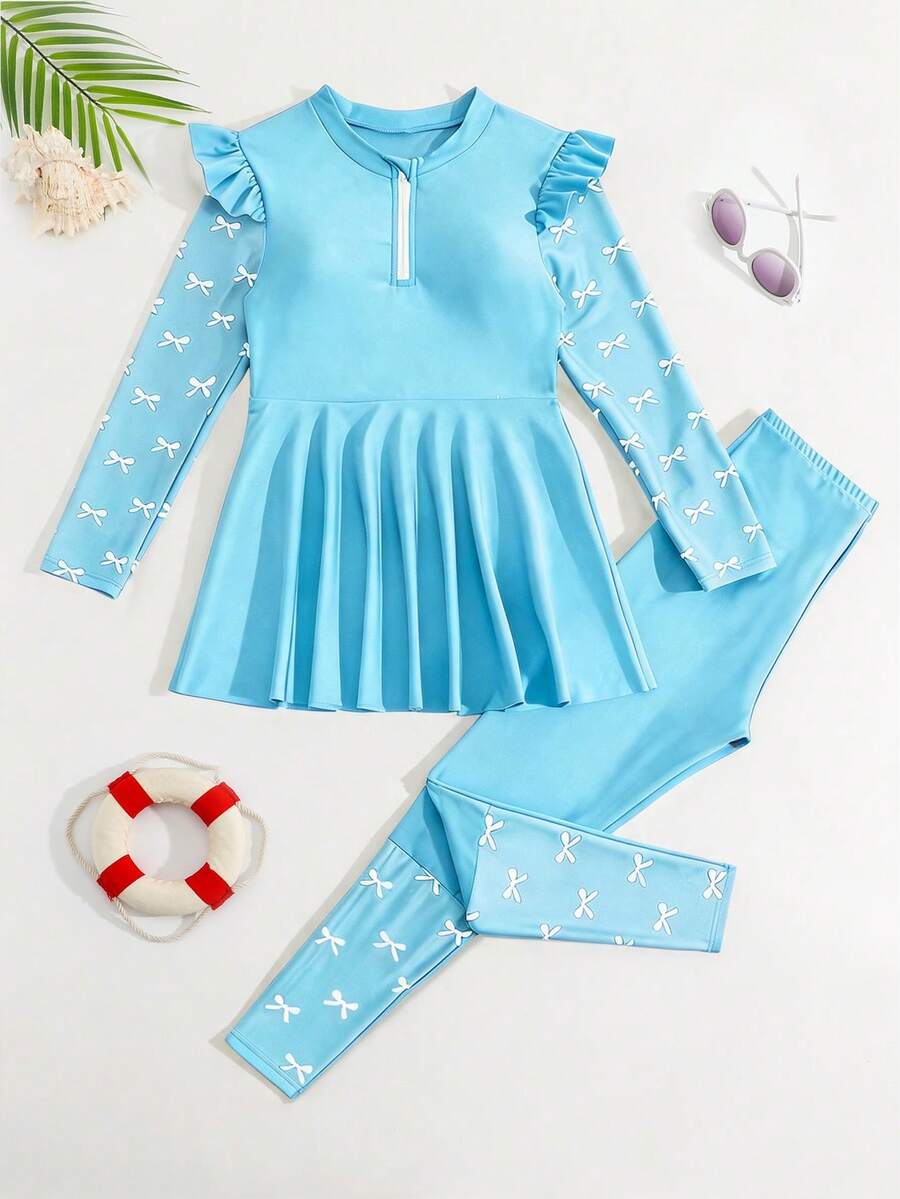SHEIN 少女两件套比基尼泳衣,白色蝴蝶结印花和纯黑色针织面料,无袖上衣和长裤,适合度假和海滩游泳。 - 淺藍色 - 查看 1