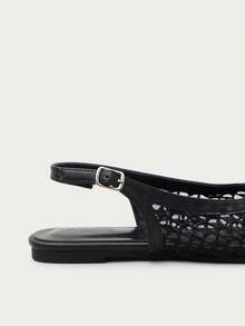Nöista Slingback Flat In Black, Crafted With Woven Textile And Mesh Detailing.
Features A Smooth Faux Leather Trim And Adjustable Back Strap With Buckle For A Secure Fit.
The Lightweight Design Adds A Modern, Elegant Touch, Perfect For Both Casual And Refined Looks. - Black 4 - View 7