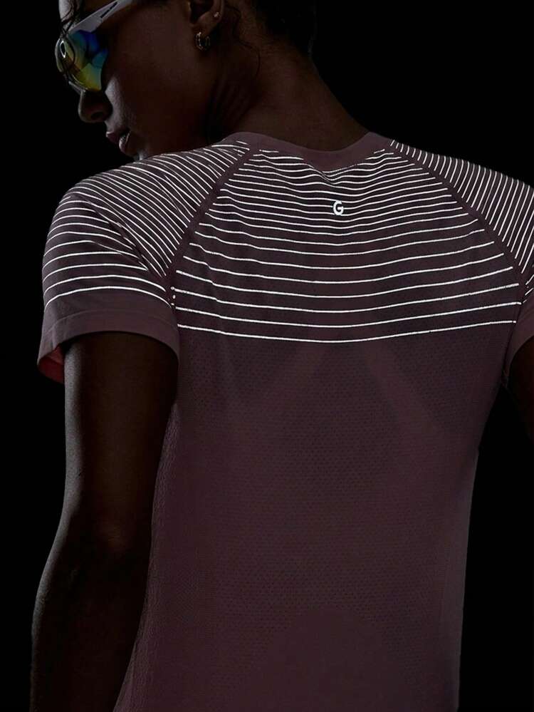 Camiseta de entrenamiento ultrasuave, sin costuras, reflectante, de manga corta, con tecnología de transporte de humedad, elástica y de longitud hasta la cadera, para correr de noche, entrenamiento, gimnasio y actividad física