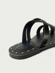 Studded Flat Sandals With Sleek Cross Straps And Open Toe Design. Easy Slip-On Style Perfect For Beach Vacation Outfits, Casual Summer Looks, And Relaxed Everyday Wear - Black - View 7