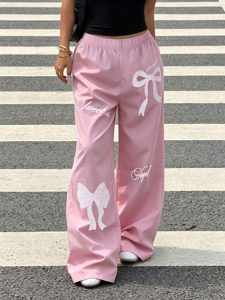 SHEIN Sparklyn 青少年女孩秋季服飾 高腰休閒可愛 Clean Girl 風格 時尚街頭風 日常上學通勤 蝴蝶結字母印花 寬鬆寬腿褲 - 彩色 - 查看 1