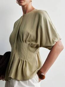 Aalyst Áo kiểu nữ mùa xuân/hè thanh lịch, sang trọng, tối giản, phong cách bohemian, thoải mái, màu trơn, chất liệu vải Tencel linen, cổ tròn, cài khuy ẩn, eo nhún, gấu áo xếp ly, tay áo cánh dơi, cổ tay bo chun. - xanh quân đội - Xem 4
