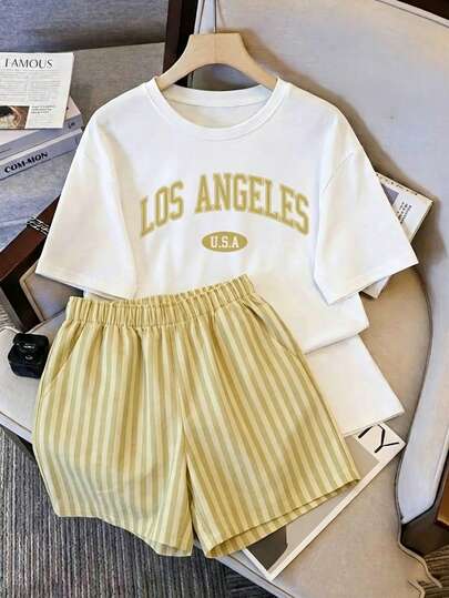 Conjunto de mujer de camiseta y shorts, playera con estampado transfer "LOS ANGELES U.S.A" en tono beige claro, letras arqueadas con estilo retro y contorno definido