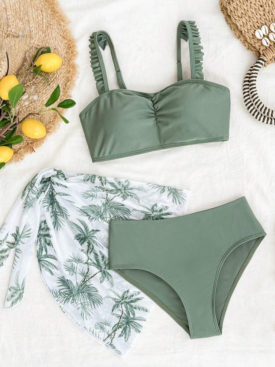 SHEIN Conjunto de traje de baño para niña preadolescente de color verde militar sólido, con parte superior sin tirantes con volantes, pantalones de baño triangulares, falda pareo, diseño elegante y casual, adecuado para nadar, vacaciones y verano (patrón aleatorio). Conjuntos de traje de baño, conjuntos de bikini conservadores, conjuntos de bikini de cobertura completa, conjuntos de traje de baño de tres piezas para niñas, ropa de playa, conjuntos de bikini para niños y niñas, trajes de baño a juego para niñas, conjuntos de traje de baño de verano, conjuntos de traje de baño de verano de dos piezas y tres piezas, conjuntos de bikini de tres piezas con faldas pareo - Verde - Ver 1