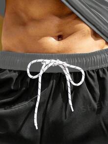 Manfinity KASUA Conjunto de 2 piezas de camiseta de manga raglán y pantalones cortos de natación para hombre, camiseta de natación con protección solar, vacaciones - Multicolor - Ver 5