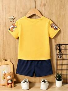 Playful Pals Bộ 2 món cho bé trai SS26: Áo tay ngắn màu vàng in hình động vật hoạt hình dễ thương sư tử và gấu, và quần short in hình động vật hoạt hình đáng yêu. - Nhiều màu - Xem 6