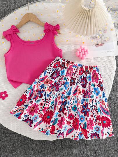 SHEIN Conjunto de dos piezas de blusa con lazo en el hombro grueso y falda estampada de flores a media pierna para niñas y niños, conjunto casual diario y de vacaciones