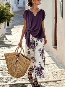 SHEIN Holidaya Bộ đồ hai mảnh thanh lịch dành cho nữ: áo tay ngắn cổ tròn hoặc cổ chữ V dáng rộng, thắt eo, vai rớt và quần ống rộng họa tiết hoa, thích hợp cho mùa hè, kỳ nghỉ xuân, lễ Phục sinh, ngày Thánh Patrick, đi biển, dã ngoại. Bộ đồ hai mảnh sang trọng, áo kiểu thanh lịch cho nữ, trang phục ngày lễ, bộ đồ thường ngày cho nữ, họa tiết hoa, áo tím, quần trắng, dáng rộng và thoải mái, cổ chữ V, thắt eo. - Màu tím - Xem 1