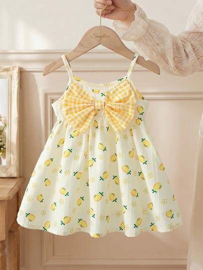 SHEIN Baby Girls' Fashion Elegant Cute Casual Minimalist Lemon Plaid Print Cami Dress, Comfortable Woven Fabric With 3D Bow Decor, Spring/Summer New Arrival, Suitable For Birthday Party, Daily Wear, Outdoor Travel And Cute Outfit