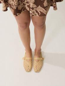 Nöista Ballet Flat In A Natural Tone, Crafted In Woven Raffia For A Breathable, Artisanal Look.
Features A Square Toe And A Central Strap With Buckle For A Secure, Structured Fit.
The Open Weave And Organic Texture Give It A Relaxed, Summer-Ready Feel With A Handcrafted Edge. - Apricot - View 4