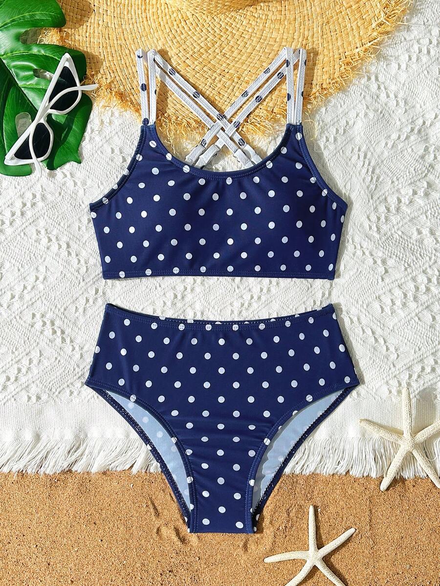 Đồ bơi bikini cho bé gái tuổi teen, đồ bơi hai mảnh cho bé gái tuổi teen, đồ bơi chấm bi cho bé gái tuổi teen, chấm bi xanh navy, phong cách retro, thiết kế dây chéo tạo thêm tính thẩm mỹ, thích hợp cho kỳ nghỉ biển, du lịch biển, hồ bơi, lướt sóng.