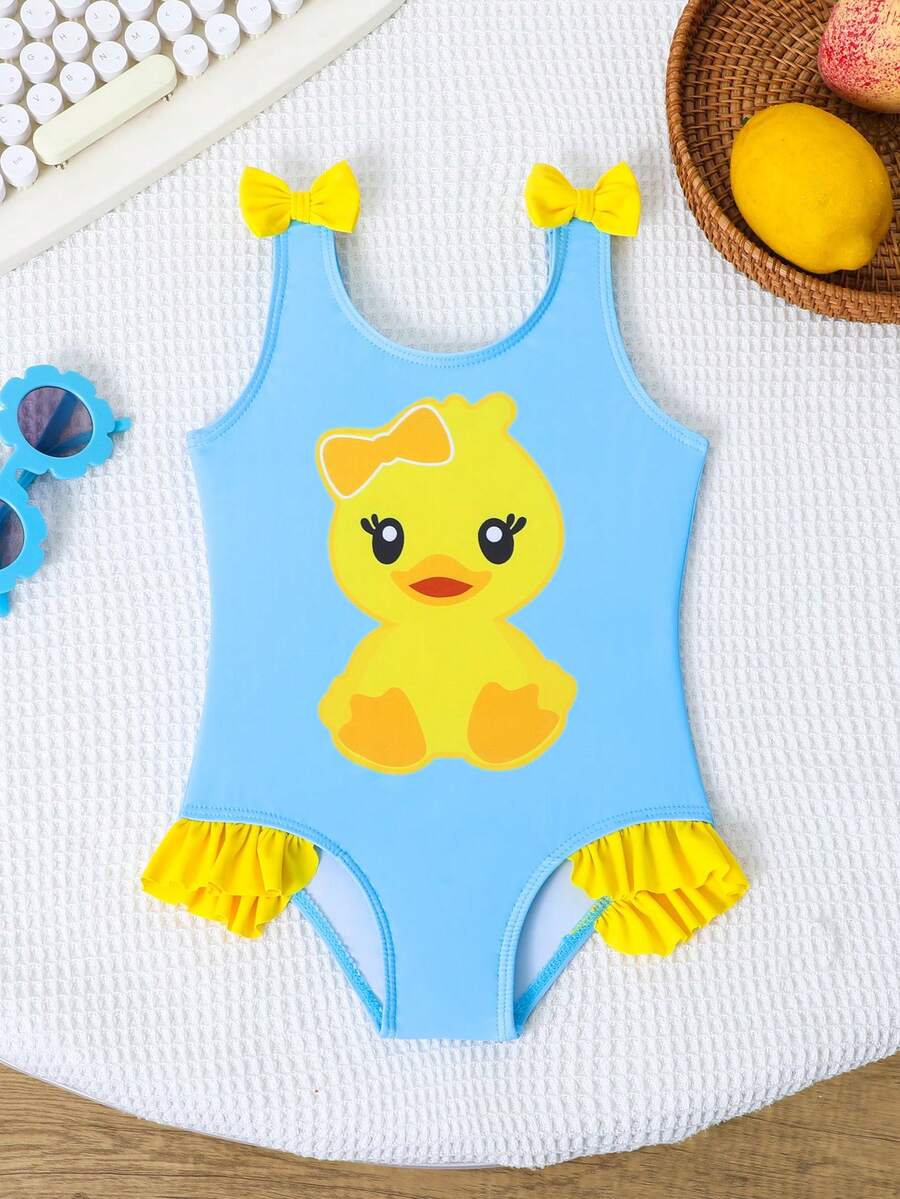 Đồ bơi cho bé gái, màu xanh nhạt và vàng tươi in hình vịt, chất liệu vải mềm mại, co giãn tốt, áo tắm liền thân không tay với dây đeo vai hình nơ và viền bèo nhún, thiết kế hình vịt dễ thương phù hợp cho bé gái đi bơi, đi biển, chụp ảnh, nghỉ hè, đi hồ bơi, mặc thường ngày, trông thanh lịch. - Màu xanh lam - Xem 1