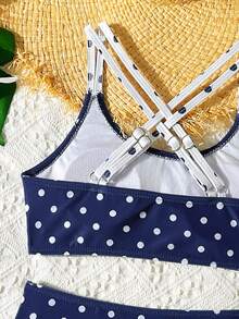 Đồ bơi bikini cho bé gái tuổi teen, đồ bơi hai mảnh cho bé gái tuổi teen, đồ bơi chấm bi cho bé gái tuổi teen, chấm bi xanh navy, phong cách retro, thiết kế dây chéo tạo thêm tính thẩm mỹ, thích hợp cho kỳ nghỉ biển, du lịch biển, hồ bơi, lướt sóng. - Nhiều màu - Xem 5