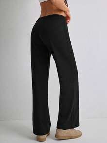 Pantalones casuales de mujer de pierna ancha de tela negra con detalle de cordón, de largo medio y elásticos - Negro - Ver 2