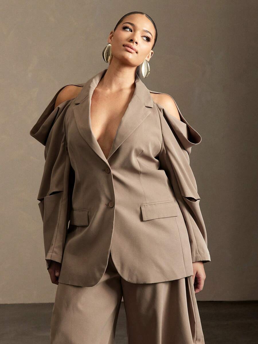 Vixey Áo blazer tay dài cổ bẻ xếp ly hở vai - Màu Khaki - Xem 1