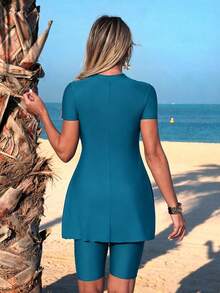 Swim Mulvari Bộ đồ bơi nữ mùa hè mới, cổ tròn, tay ngắn, xếp ly vai, xẻ tà và quần short Bermuda đen, kiểu dáng thoải mái, thích hợp cho kỳ nghỉ hoặc đi biển. - Màu xanh lam - Xem 2