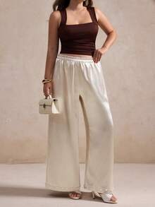 Elegantrix Calça pantalona de cetim com detalhes em pérola, ideal para encontros casuais, festas e para o dia a dia, perfeita para a primavera/verão. - Damasco - Ver 8