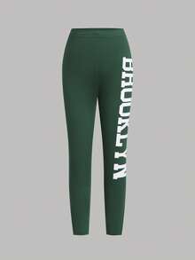 Bộ đồ thường ngày cho bé gái: Áo thun ngắn tay in chữ màu xanh lá cây và quần legging bó sát. - màu xanh lá - Xem 3