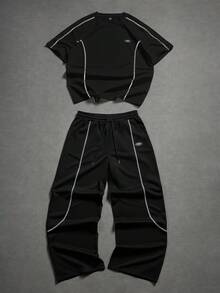 Manfinity Hypemode Bộ đồ nam thường ngày gồm áo thun ngắn tay in chữ và quần short. - màu đen - Xem 3