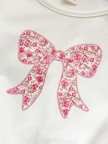 Cozy Pixies Conjunto de camiseta con estampado de lazo rosa y pantalones acampanados para niña - Rosa - Ver 5