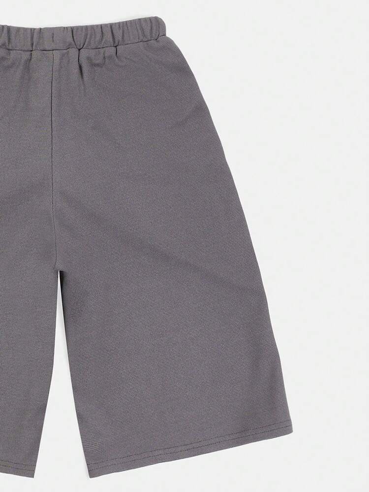 Pantalones cortos de punto de gofre con cordón, cintura elástica con detalle de logo, cómodos y casuales para el verano, de longitud hasta la rodilla, ajuste regular, con bolsillos laterales, relajados