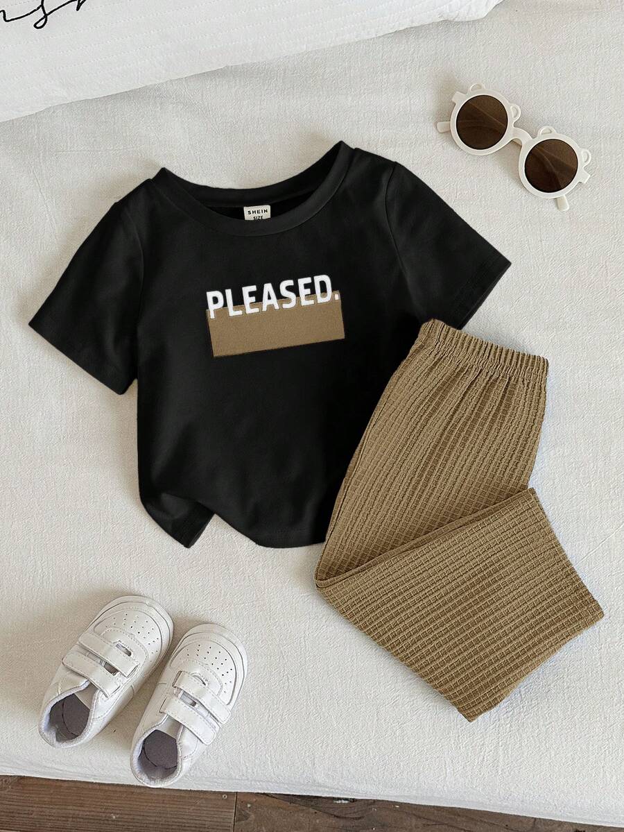 SHEIN 2pcs Baby Boys/Girls Cute Casual Waffle Fabric Short Sleeve Pants Pajama Set, Suitable For Home, Daily Wear And Outings, Spring/Summer - Multicolor - View 1