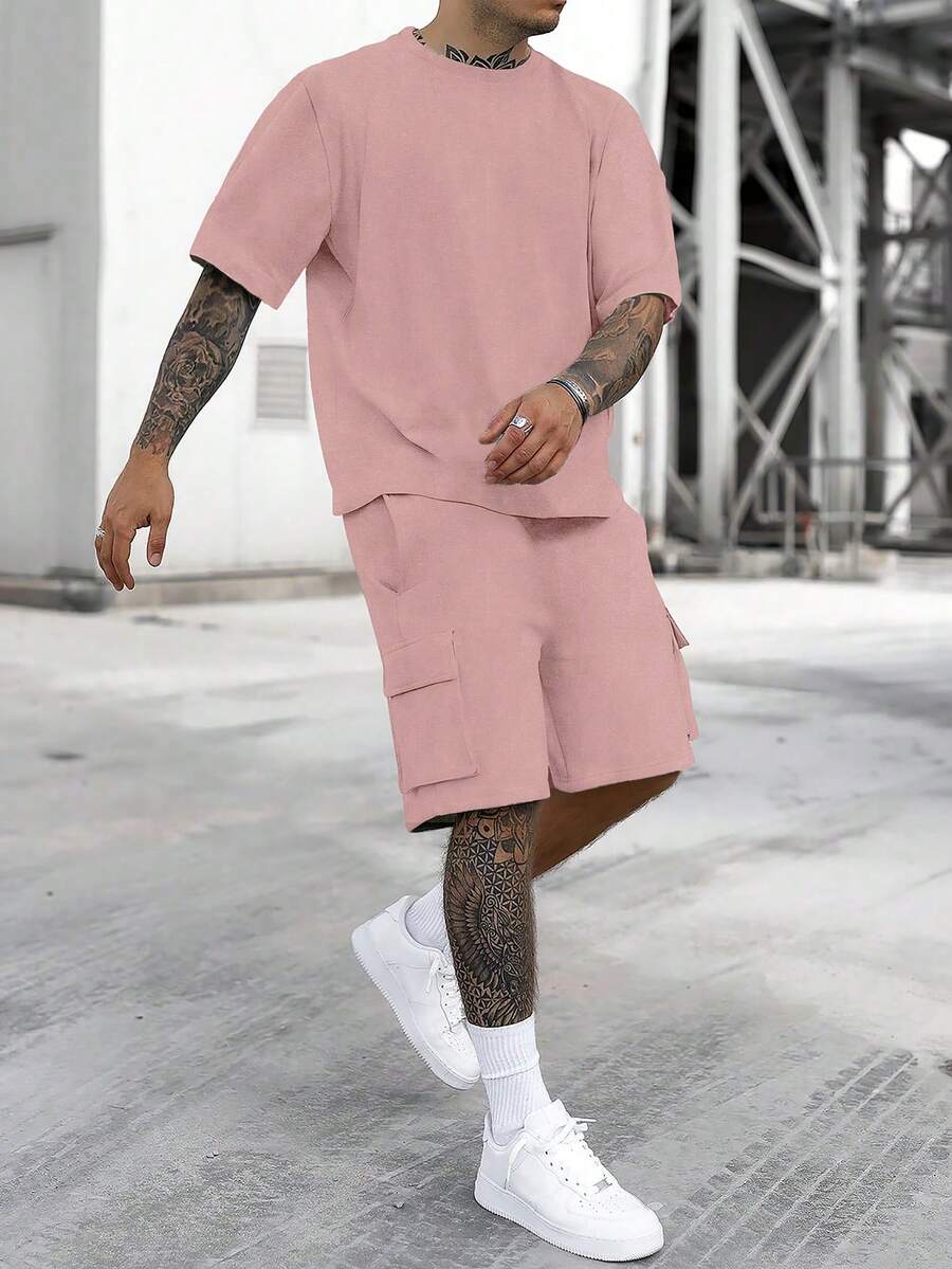Manfinity Homme Bộ đồ nam cỡ lớn gồm áo thun ngắn tay cổ tròn màu trơn và quần short, thích hợp mặc hàng ngày. - Bụi hồng - Xem 1