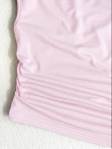 Áo kiểu lệch vai màu hồng cho bé gái tuổi teen, dáng crop top một vai (trang trí sao biển vàng), chất vải mềm mại thoải mái, thiết kế vai độc đáo + trang trí tinh tế, phù hợp cho các dịp thường nhật/sự kiện, không bó sát, dễ phối đồ, tạo nên vẻ ngoài cá tính và sành điệu cho bé gái. - Hồng - Xem 4