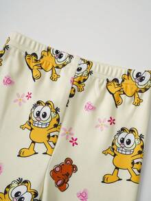 GARFIELD | SHEIN Bộ đồ mặc nhà thoải mái cho bé gái, gồm áo và quần ngắn tay cổ tròn in chữ hoạt hình. - Màu vàng - Xem 7