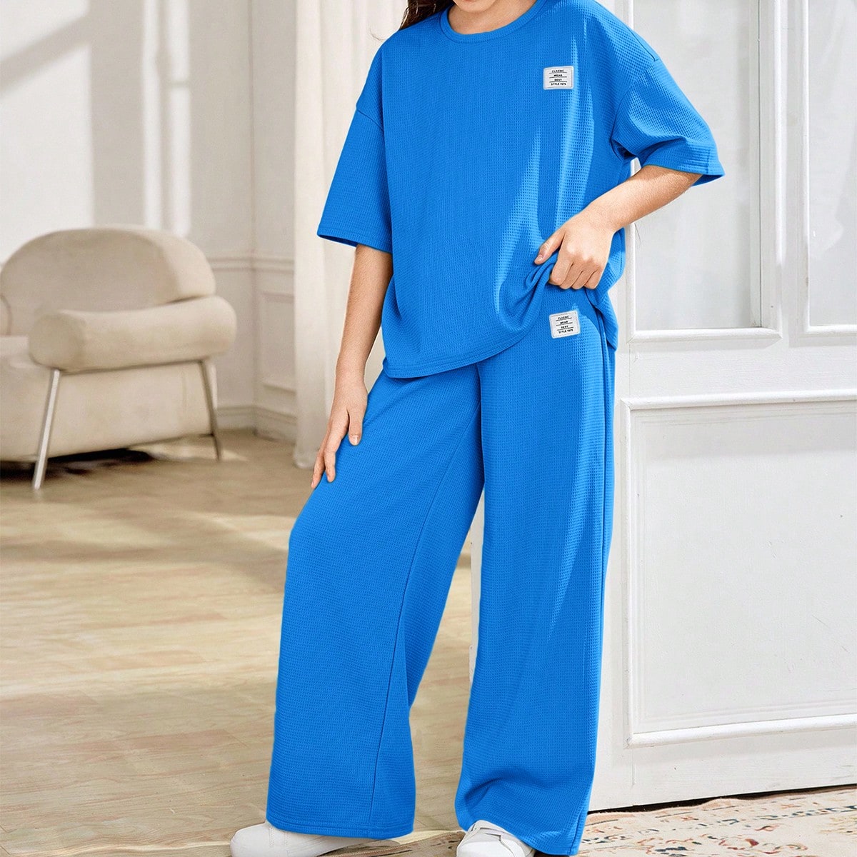 Conjunto informal de 2 piezas de camiseta de manga corta de cuello redondo holgada y cómoda, y pantalones para niñas preadolescentes