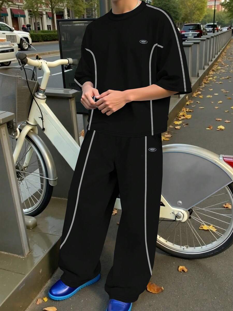 Manfinity Hypemode Bộ đồ nam thường ngày gồm áo thun ngắn tay in chữ và quần short. - màu đen - Xem 1