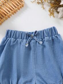 Quần short denim mùa hè cho bé gái, cạp chun, nơ và xếp ly ở gấu quần, kiểu dáng dễ thương, thoải mái. - Màu xanh lam - Xem 3