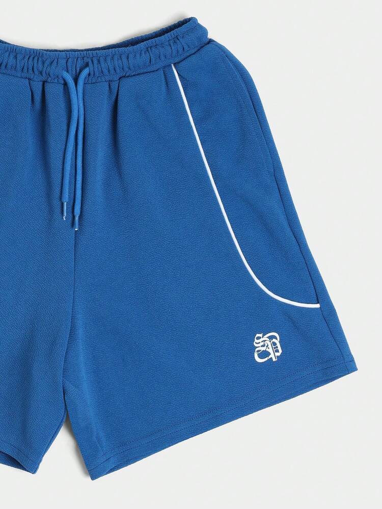Conjunto de Camiseta e Shorts Coordenados para Meninos Pré-Adolescentes com Gola Redonda e Mangas Curtas, em Azul Cobalto com Detalhes em Branco, Casual para Verão e Brincadeiras