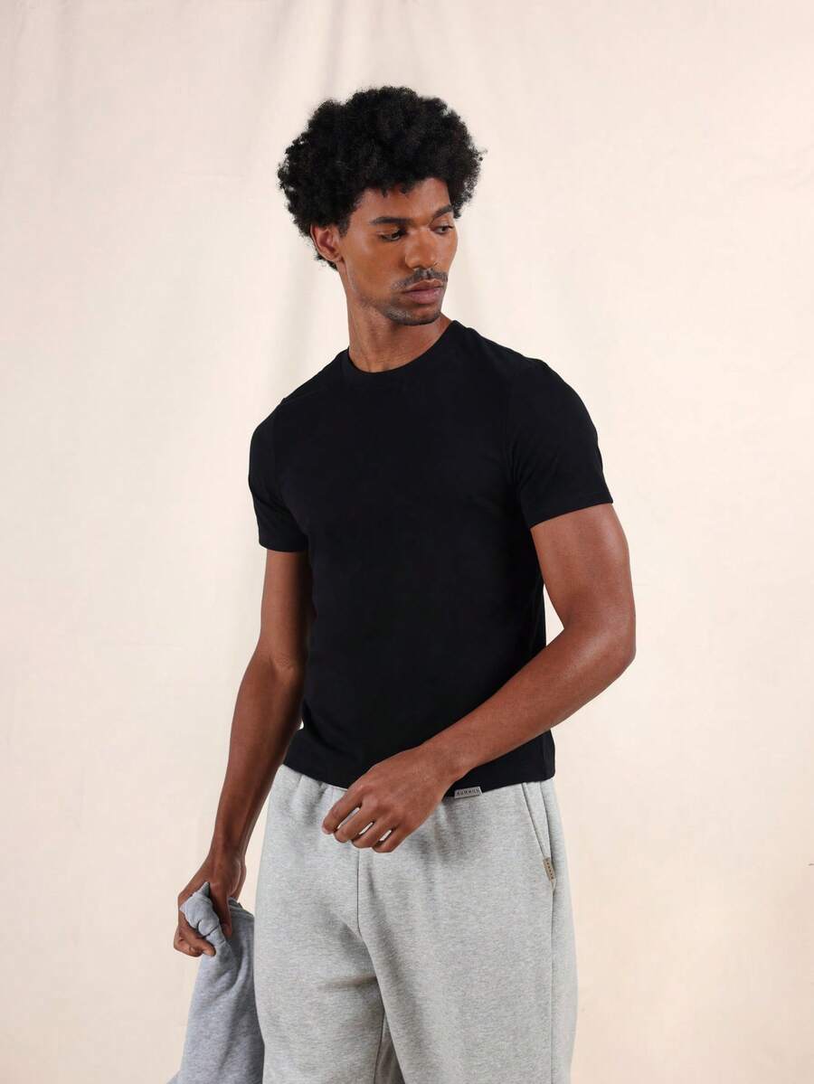 SUMWON Camiseta básica de manga corta de cuello redondo de algodón negro de corte slim Elliot, uso casual diario clásico - Negro - Ver 1