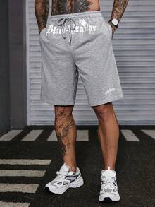 DAZY Quần short nam dáng rộng, thời trang thường ngày, in chữ, dây rút, túi chéo, thích hợp mặc đi làm, mùa hè. - Màu Xám nhạt - Xem 6