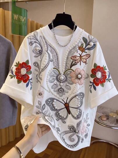 Elenzga 女士优雅通勤珍珠、蝴蝶和花卉印花宽松圆领短袖衬衫，春夏款