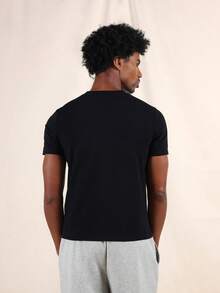 SUMWON Camiseta básica de manga corta de cuello redondo de algodón negro de corte slim Elliot, uso casual diario clásico - Negro - Ver 3