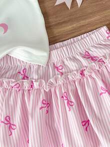 Cozy Pixies Chân váy xếp ly họa tiết nơ cho bé gái, dễ thương và đáng yêu. - trắng - Xem 4