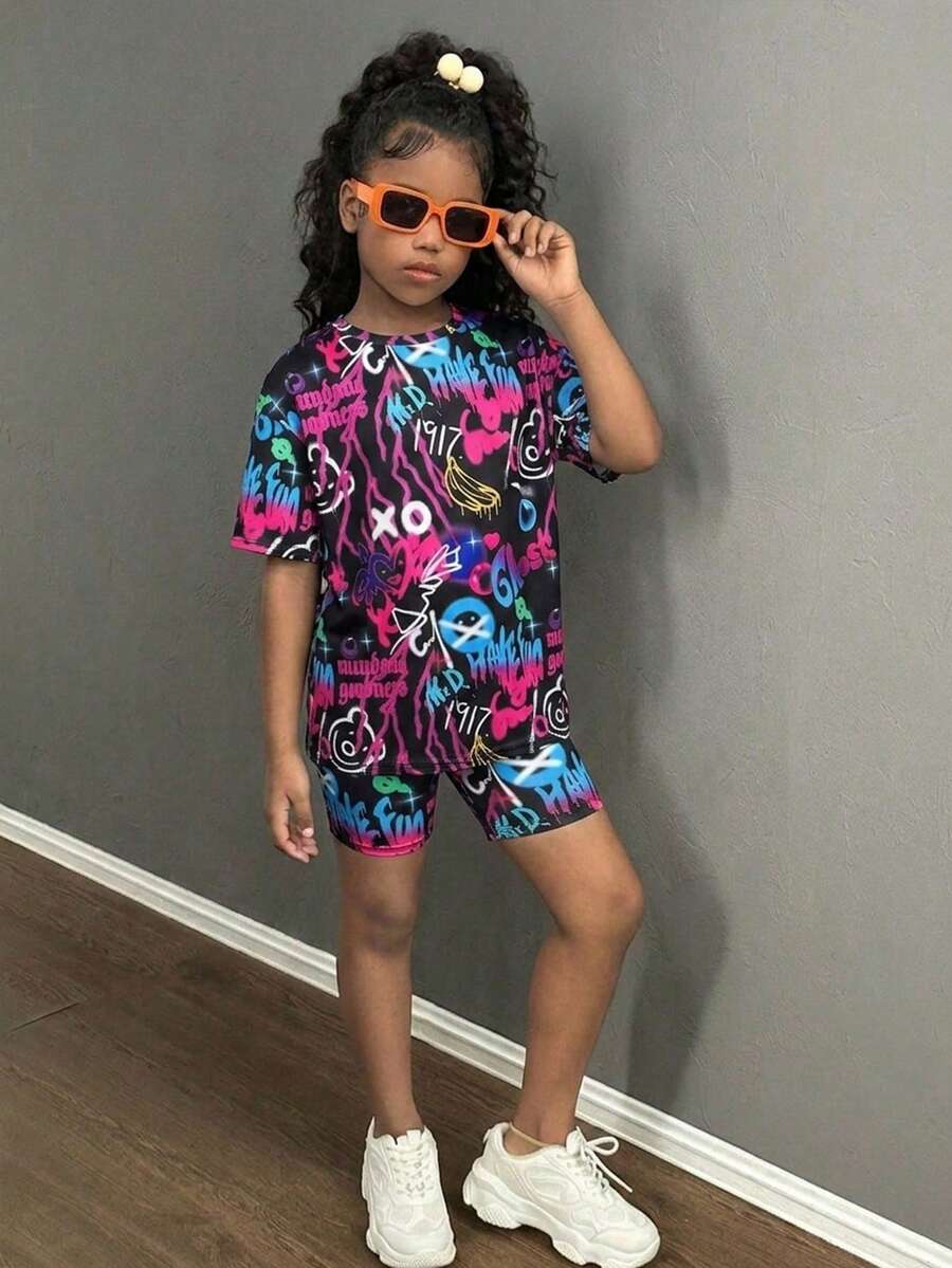 Bộ đồ thể thao 2 món cho bé gái tuổi teen, gồm áo thun rộng và quần short bó sát, kiểu nhuộm tie-dye và in họa tiết. - màu đen - Xem 1