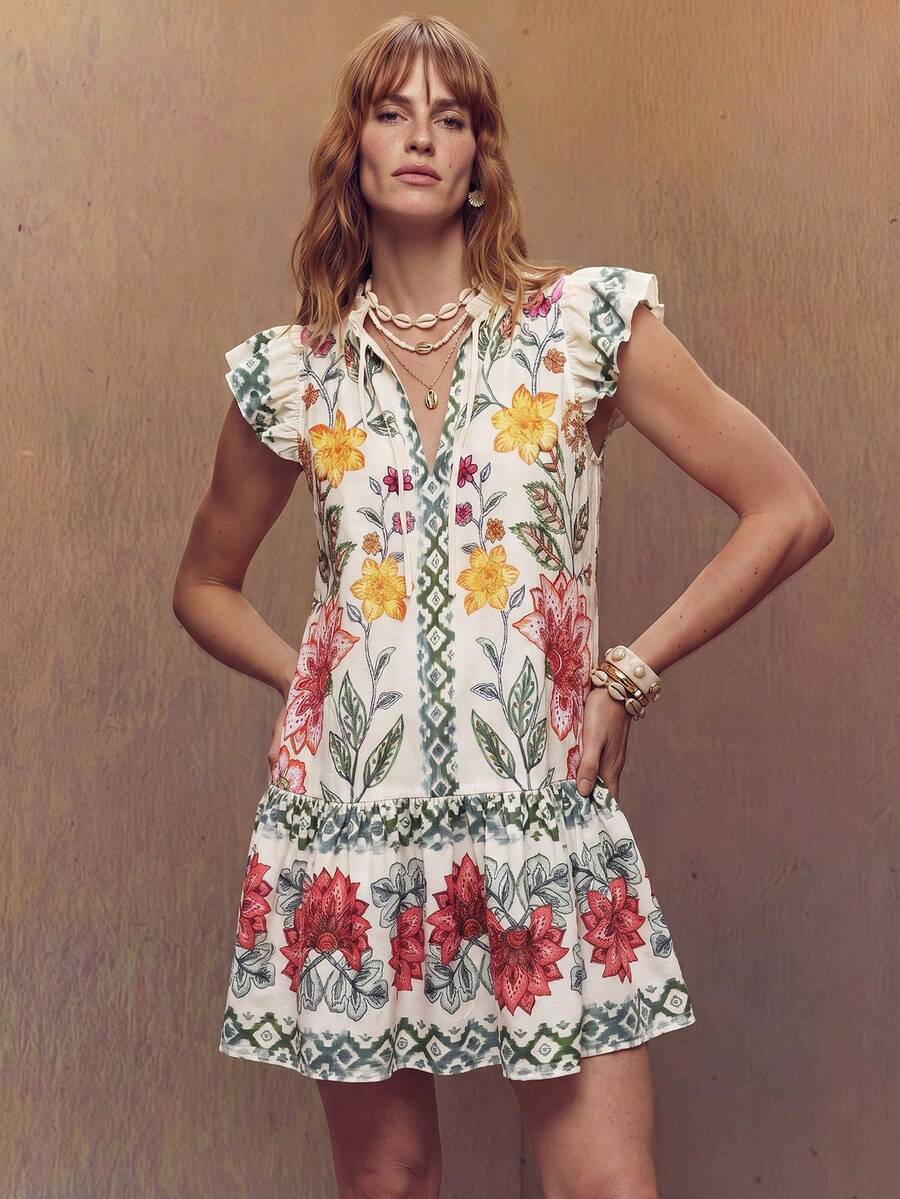 Fembélia Vestido corto con volantes en el bajo, estampado floral, primavera/verano 2026. Vestido holgado de línea A, cuello en V, manga corta - Multicolor - Ver 1